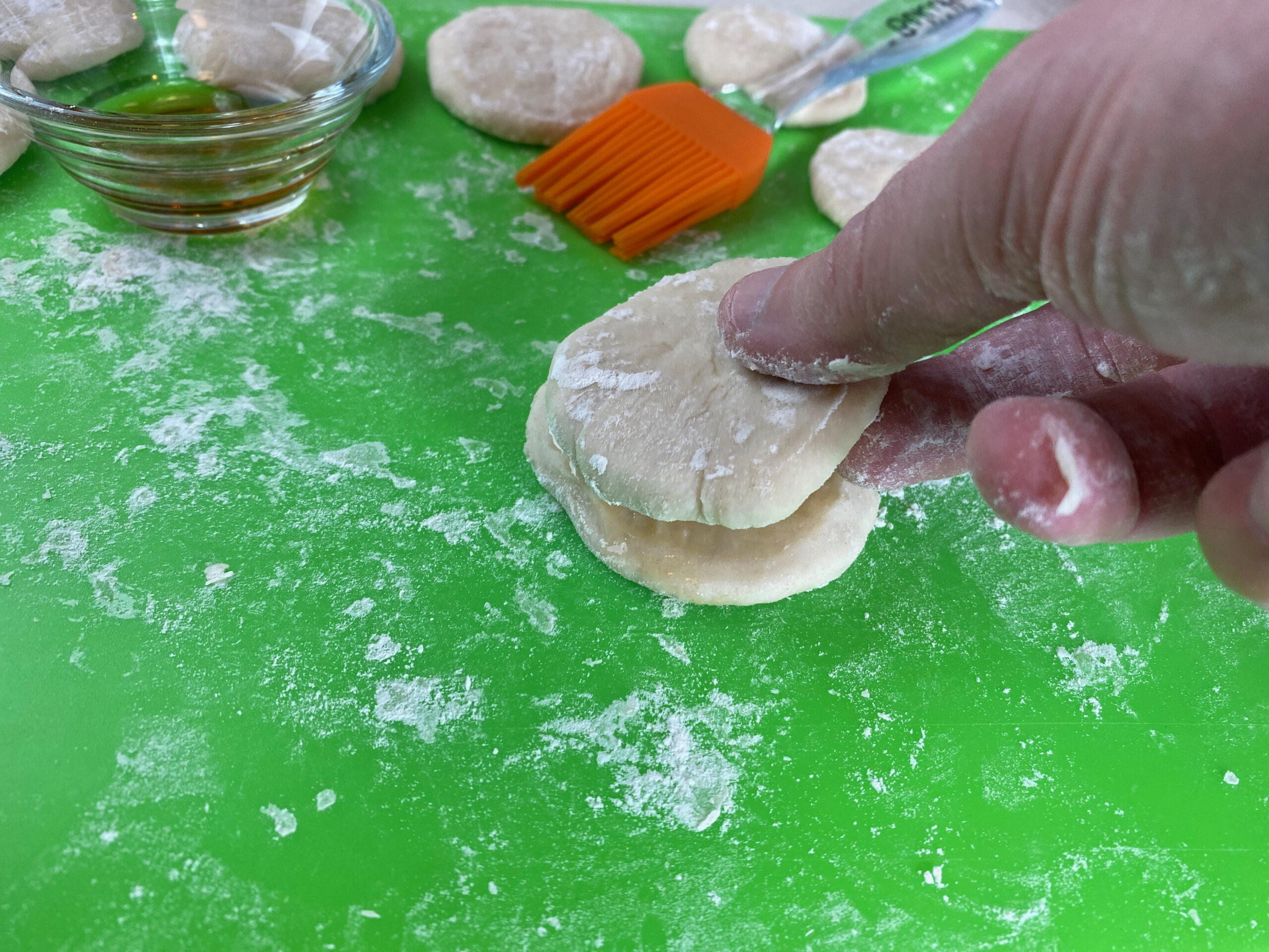 a disk of dough is set on top of another
